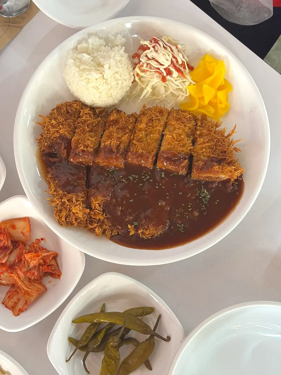 Table set with dakdoritang and king pork cutlet