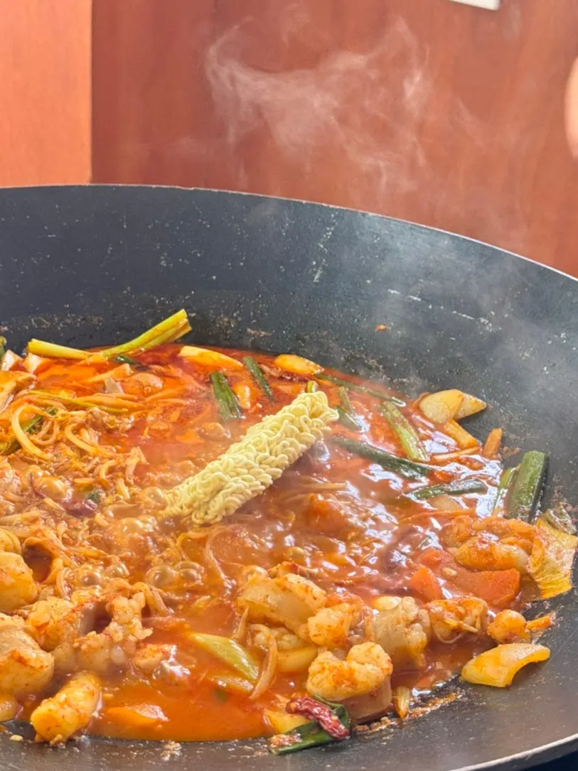 Spicy sauce broth boiling vigorously