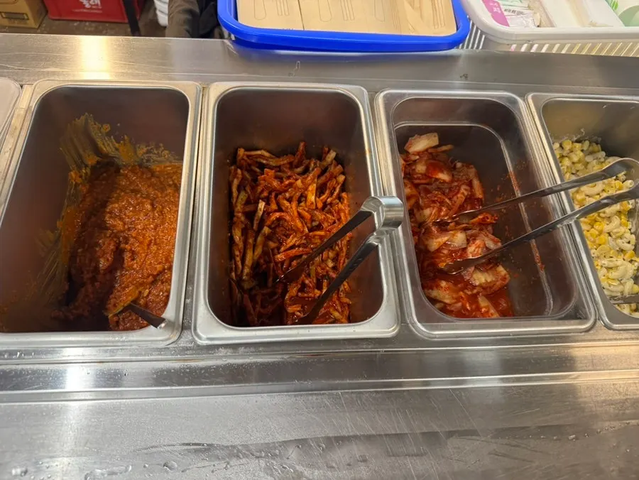 Tidy self-serve bar and a corner of the restaurant