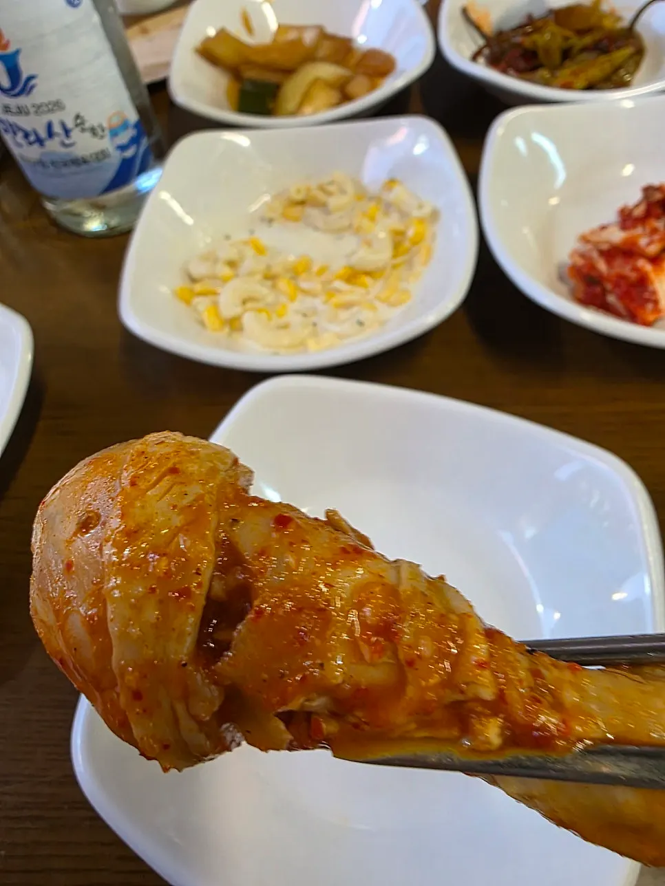 A plate of dakdoritang served as it continues to simmer