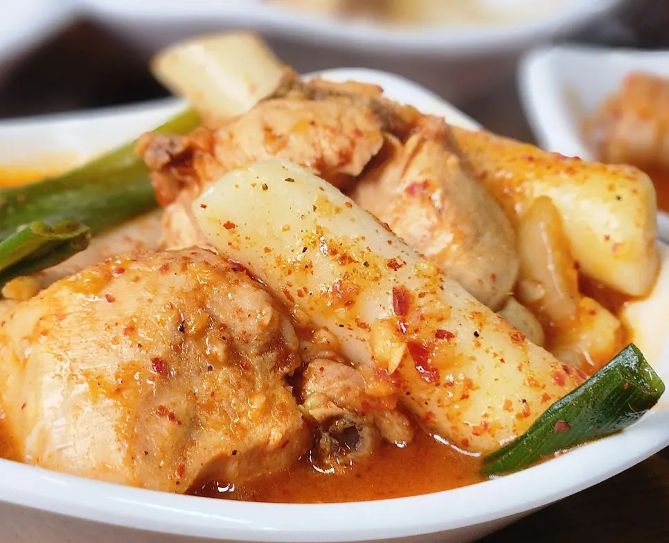 Close-up of dakdoritang with thick red pepper seasoning