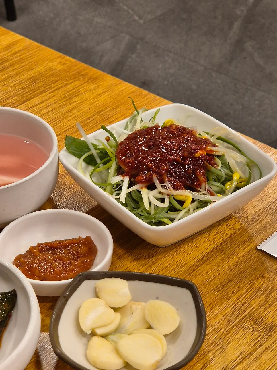 Raw galbi eaten with scallion salad