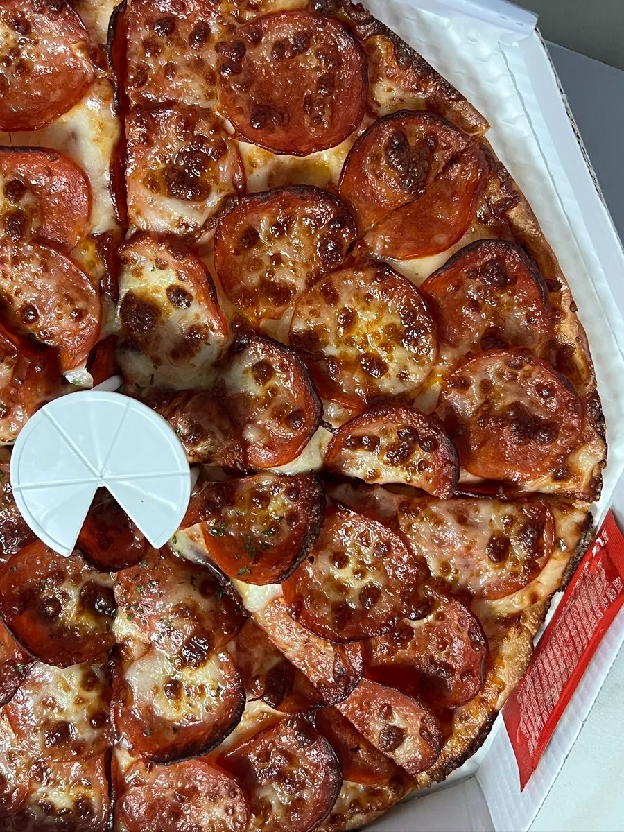 Happiness Pizza takeout menu spread