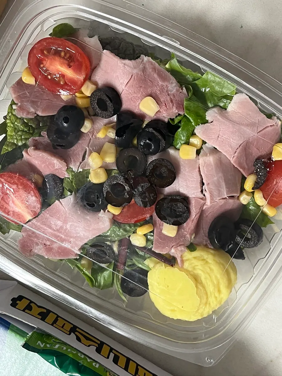 Leftover pizza slices and the takeout box