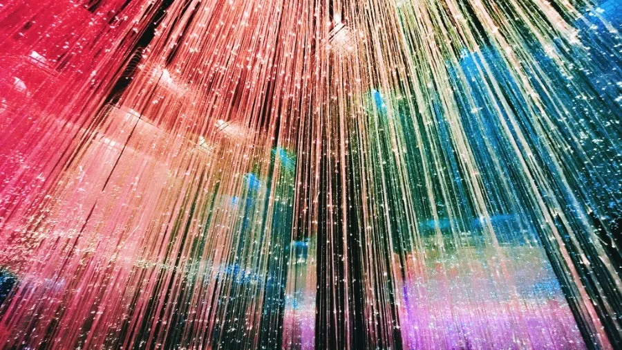 Dazzling light display unfolding past the secret door