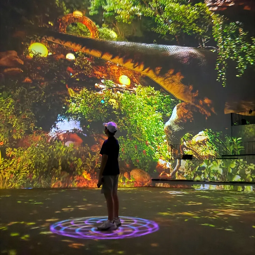 Visitors viewing media art at Warang Warang