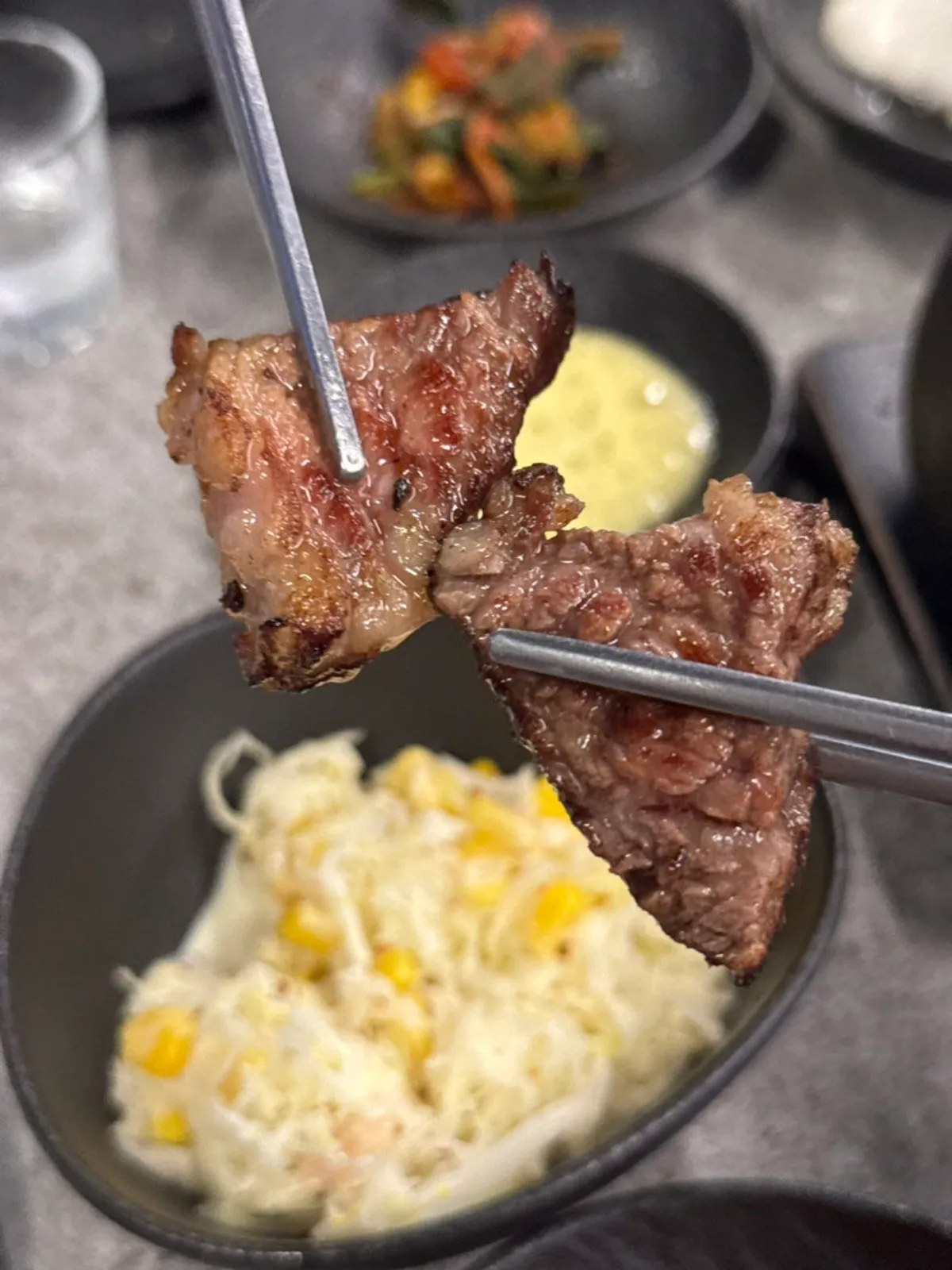 Signature photo of straw-fire udae galbi at Jeju Udae Nohyeong