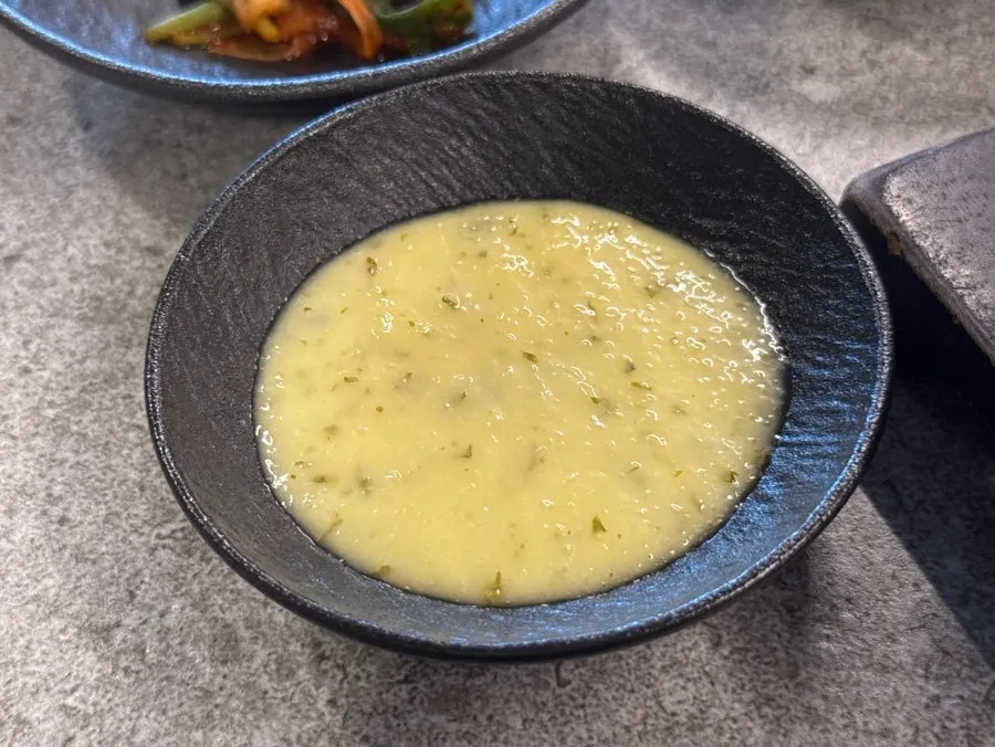 Garlic sauce served alongside udae galbi