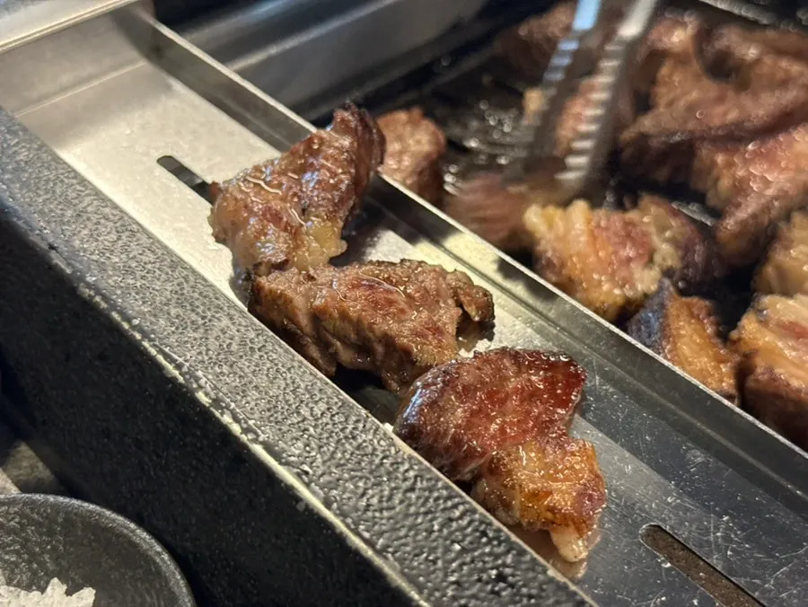 Perfectly cooked udae galbi grilled by staff