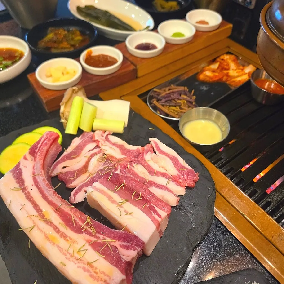 Signature photo of grilled black pork at Jeju Oktop, Gwangju Gyeongan Branch