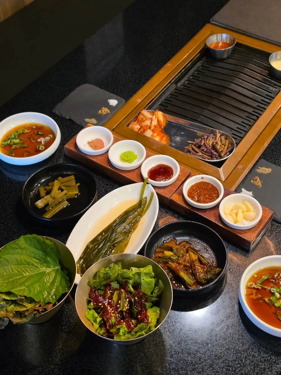 Basic table setting with myeoljeot sauce and side dishes