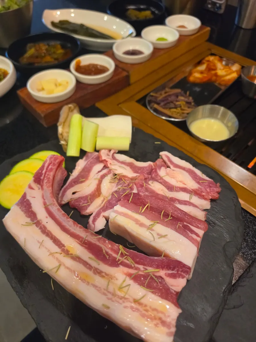 Raw black pork bonsamgyeop on a plate
