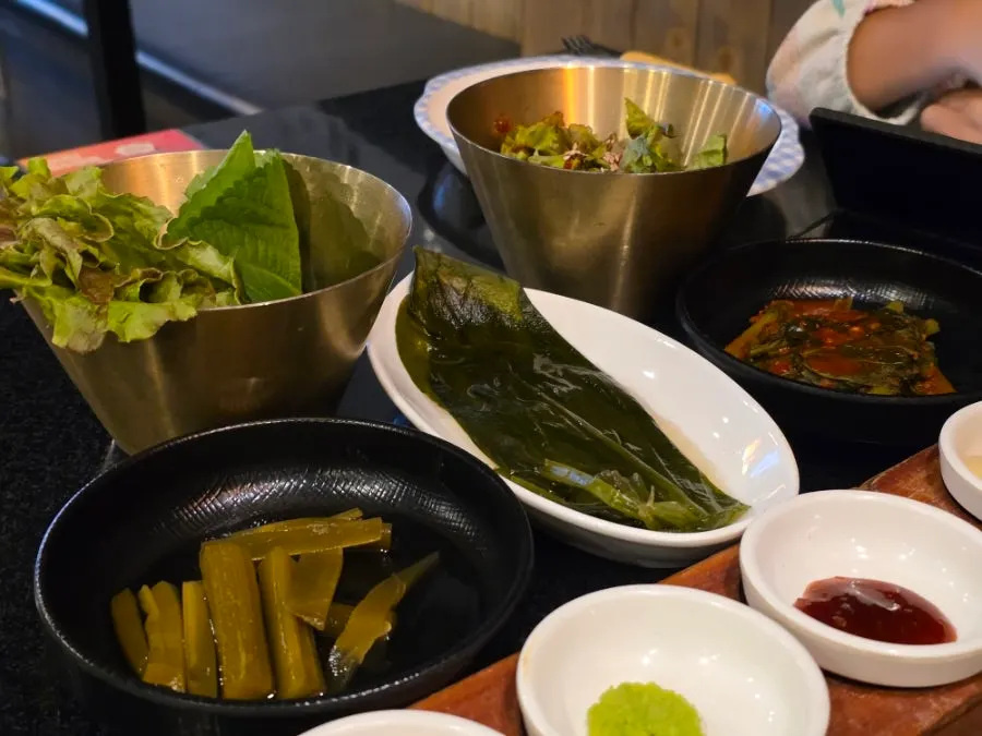 Table setting with basic side dishes and salt