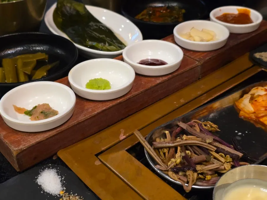 Grilling table with salts and sauces laid out