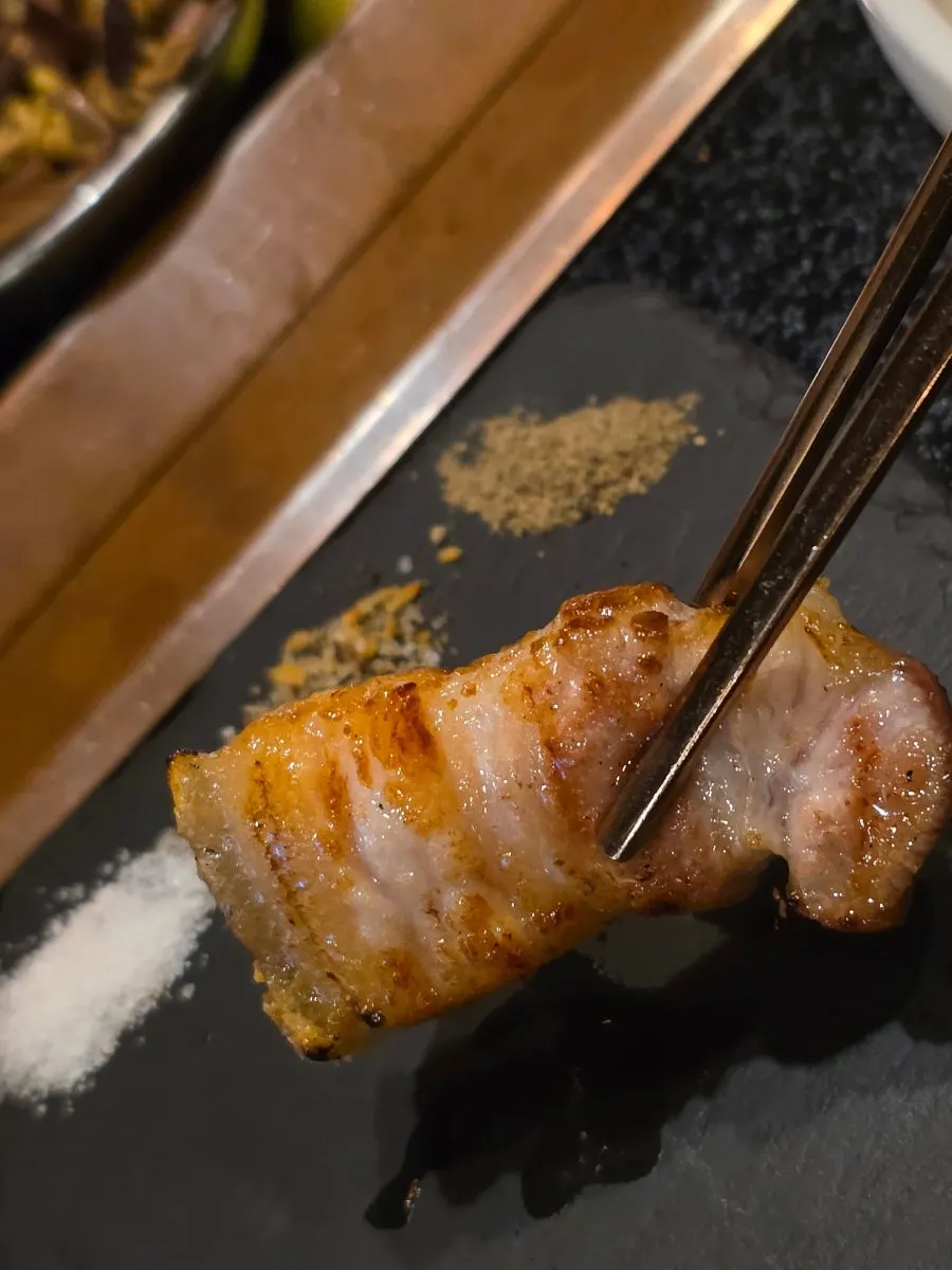 Thick-cut black pork on the grill