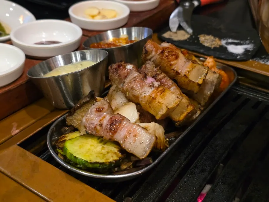 Plate of pork belly grilled by staff