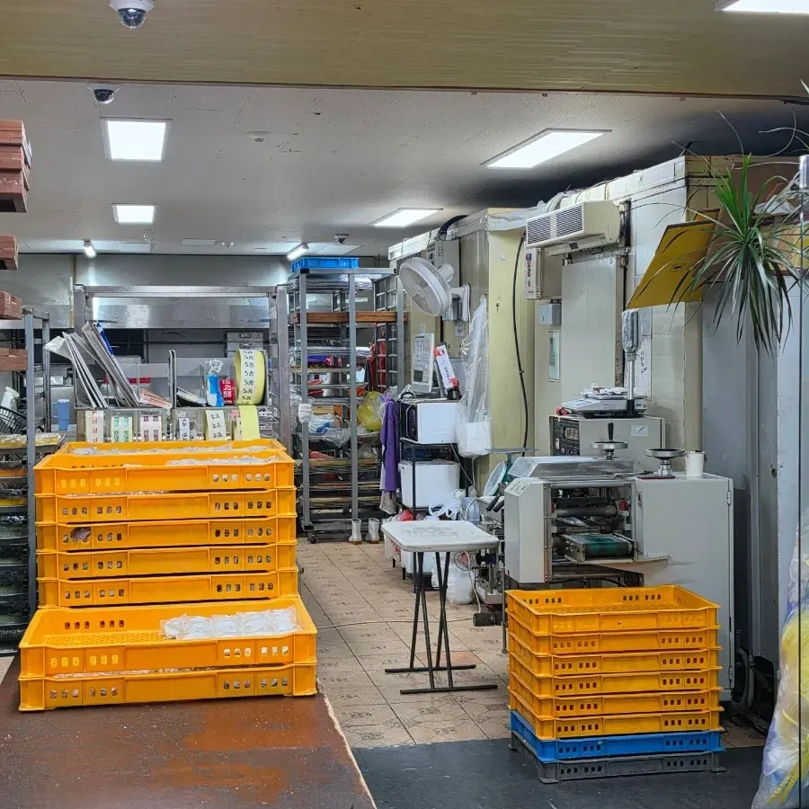 Open-style rice cake production area behind the display case