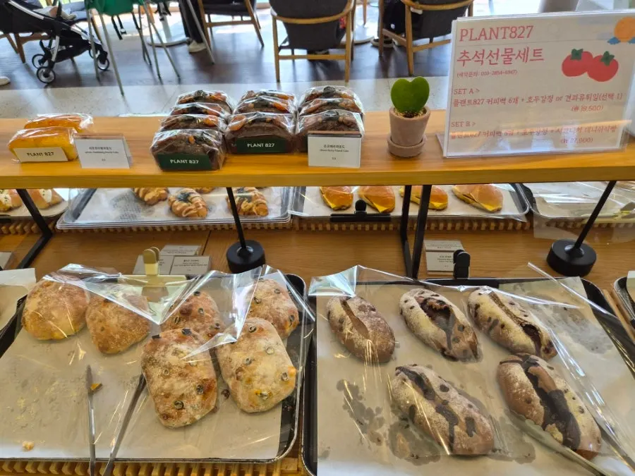 Bakery counter with a sign introducing the chewy cream roll