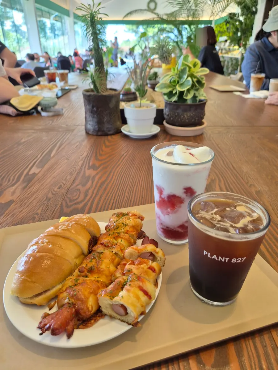 Two breads and two drinks set up at an indoor table