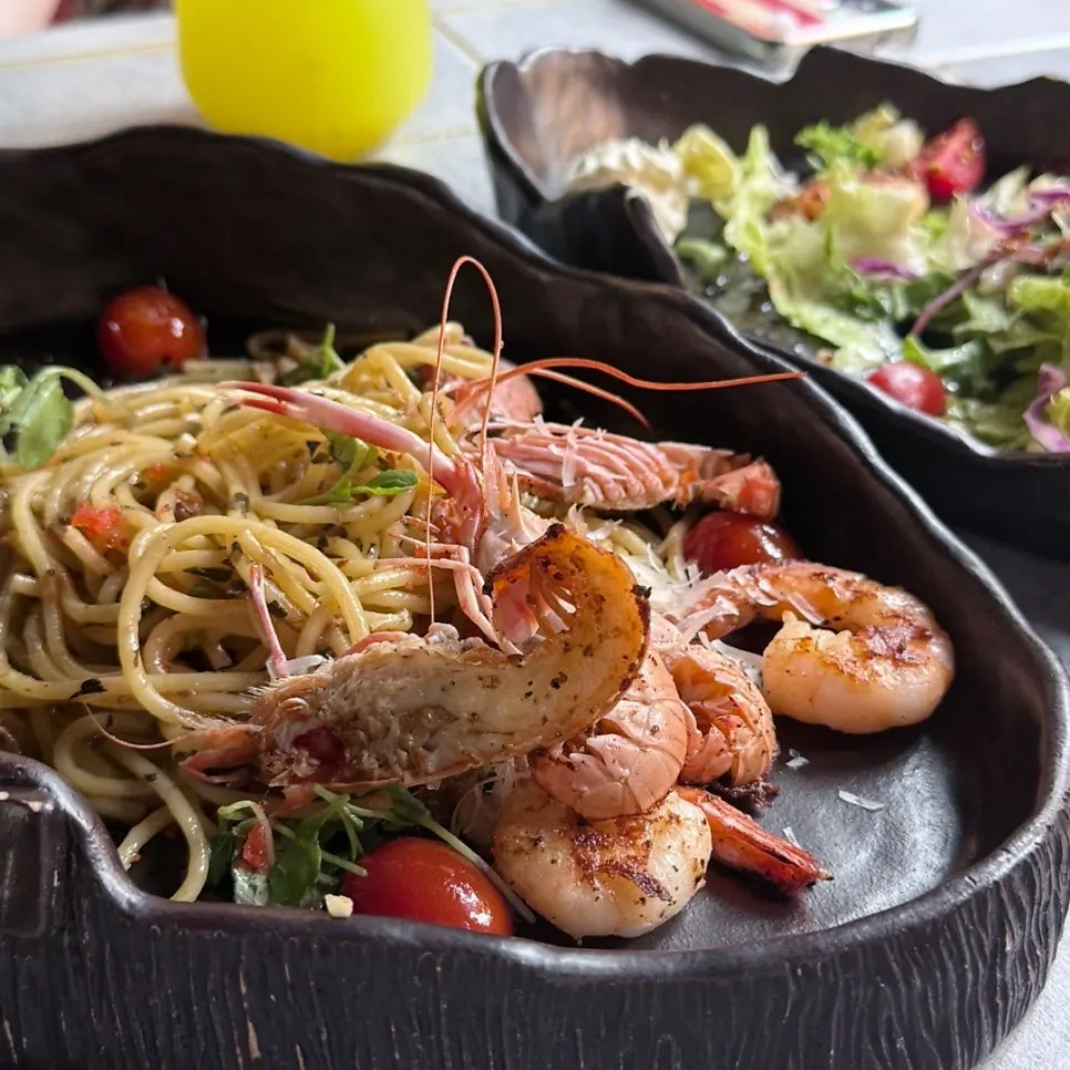 Shrimp piled on top of the Alhi salad