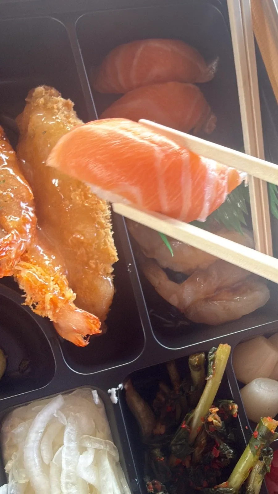 Takeaway sushi enjoyed at the beach