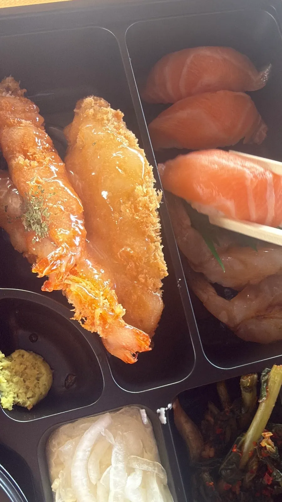 A takeaway meal of mild raw shrimp sushi