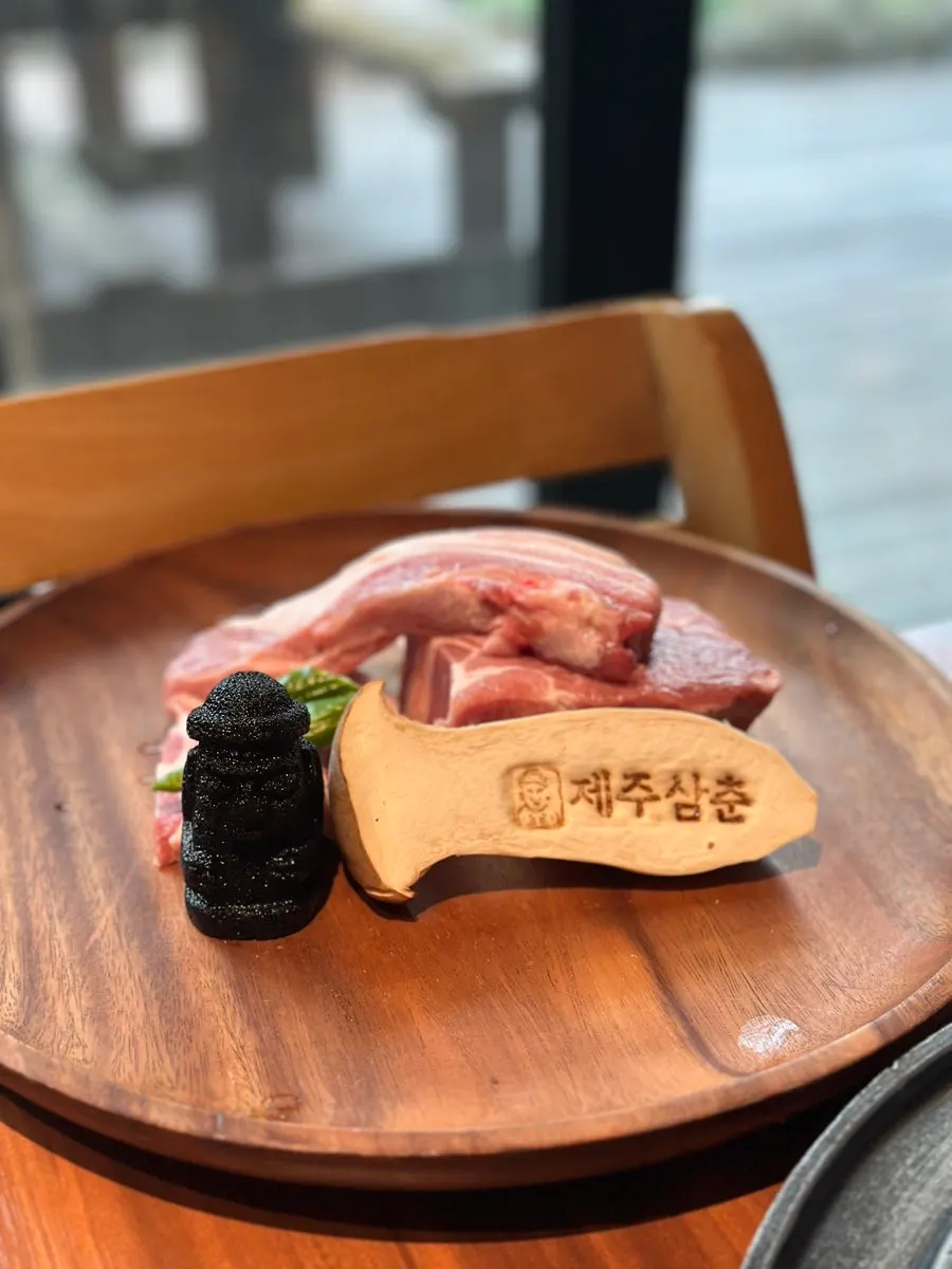 Plate of freshly smoked black pork after ordering
