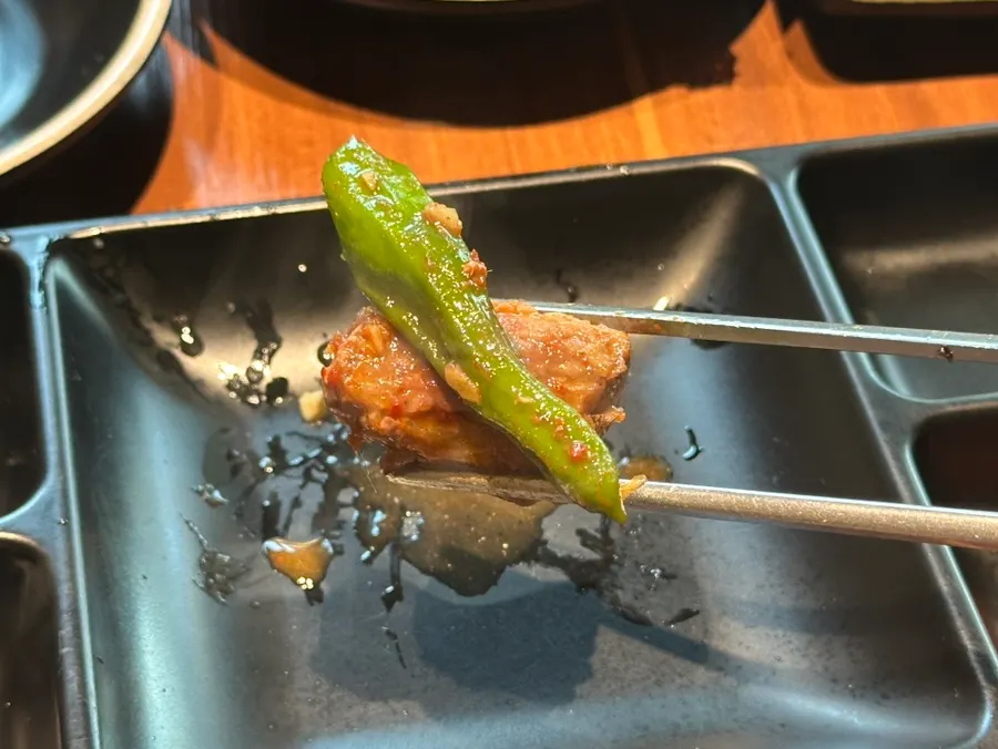 Grilled black pork dipped in myeoljeot sauce