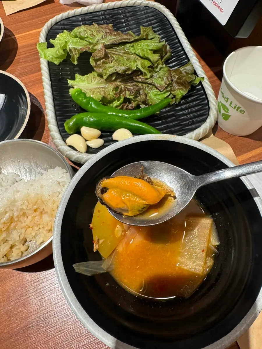 Seafood doenjang jjigae with a whole crab inside