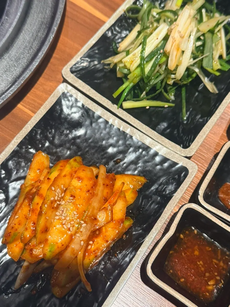 Banchan spread set out quickly after ordering