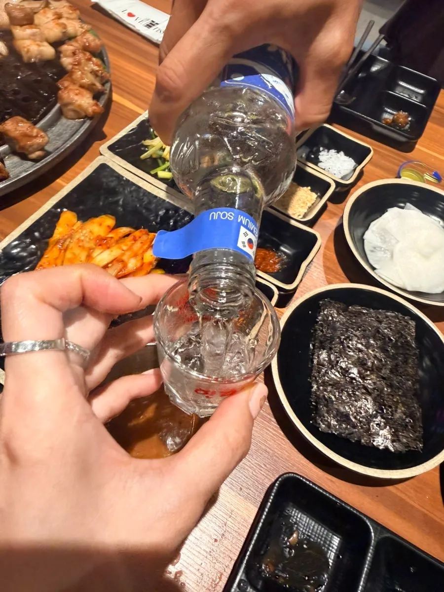 Grilled black pork with a glass of Hallasan soju