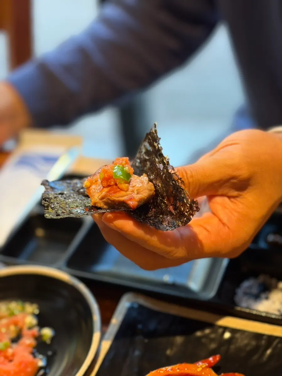 Black pork seaweed wrap with pollack roe sauce