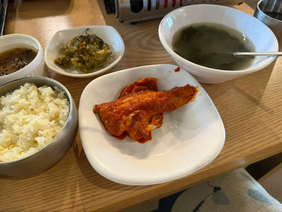 Thick boneless cutlassfish meat lifted out with a ladle
