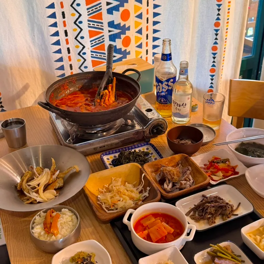 Overall table view of the boneless cutlassfish stew set at Sikgwa Hamkke