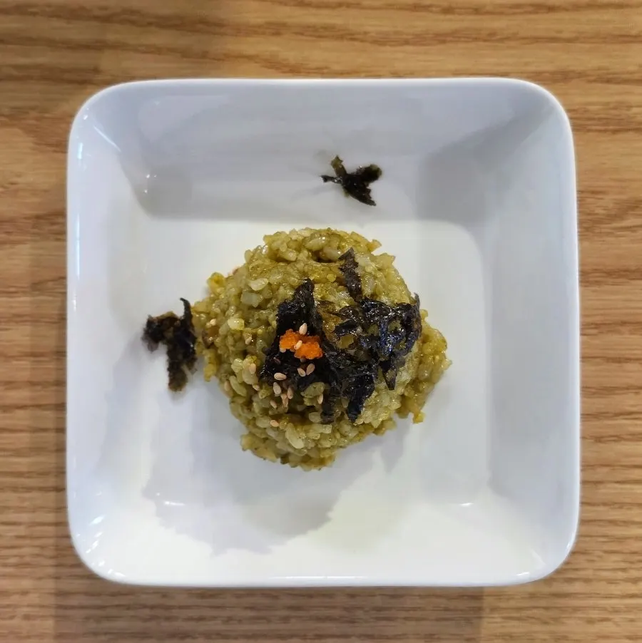 A bowl of nutty abalone and top shell shrimp rice