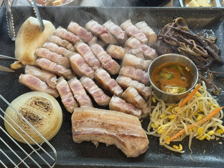 180g portion of grilled black pork per person
