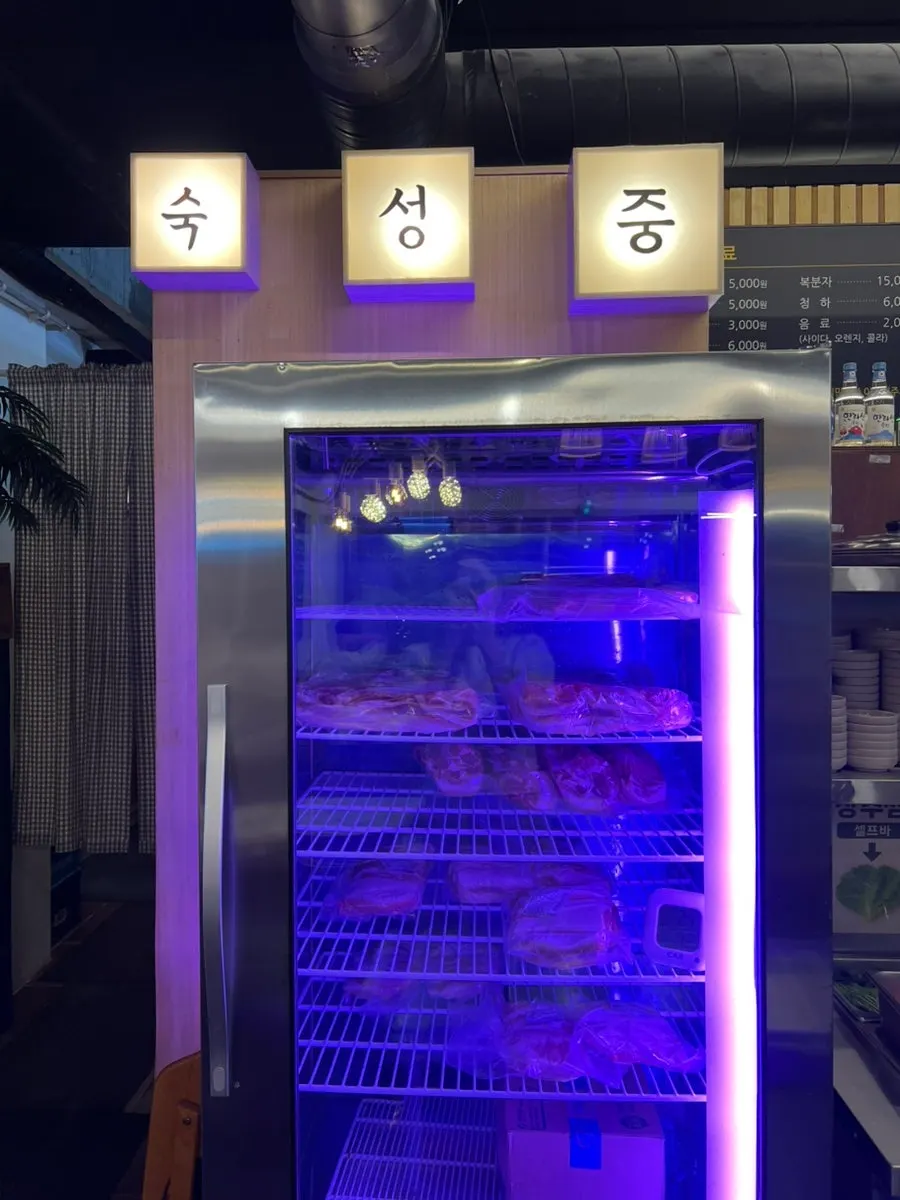 In-house aging fridge for black pork