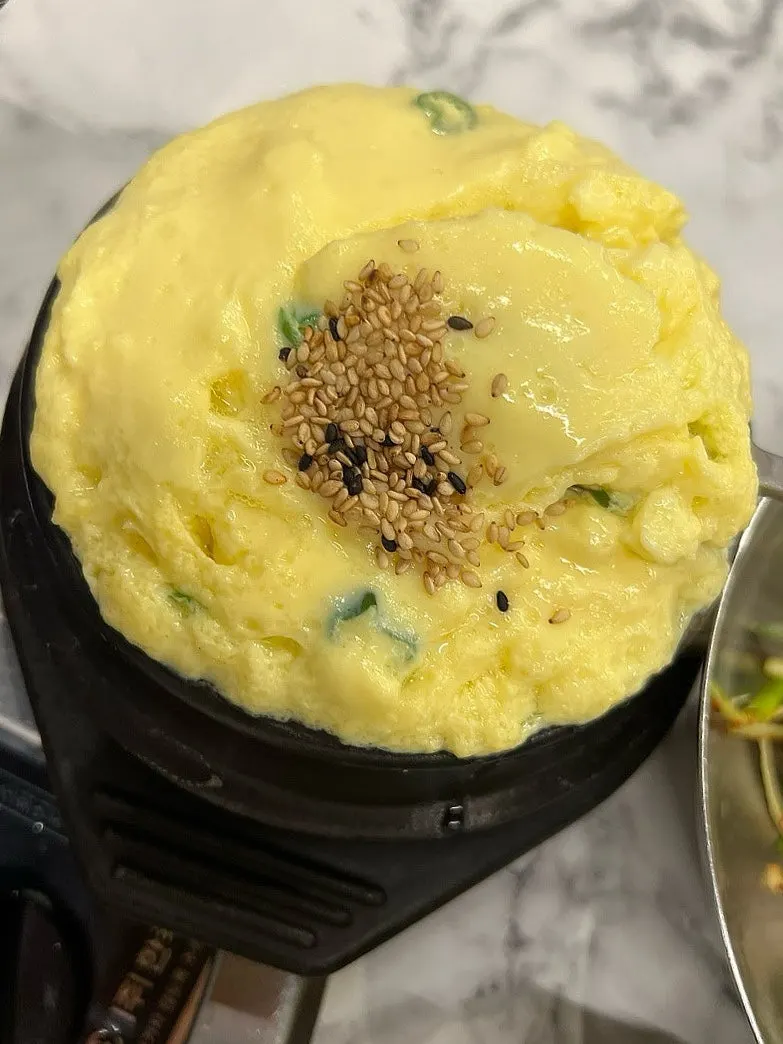 A spoonful of soft steamed egg custard