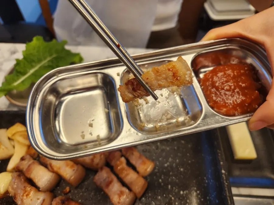 Golden-brown grilled aged black pork belly