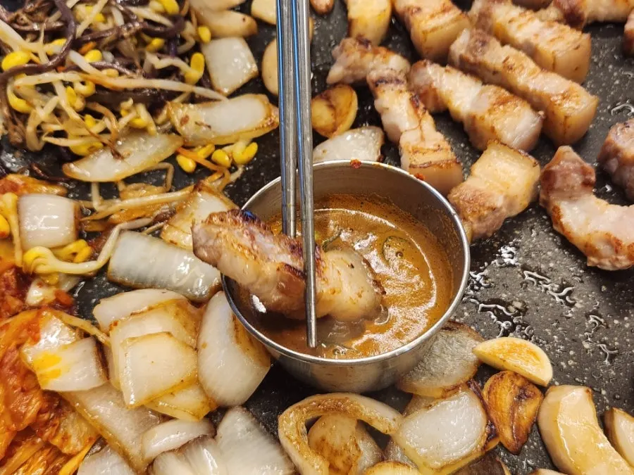 Cross-section of pork belly with skin attached