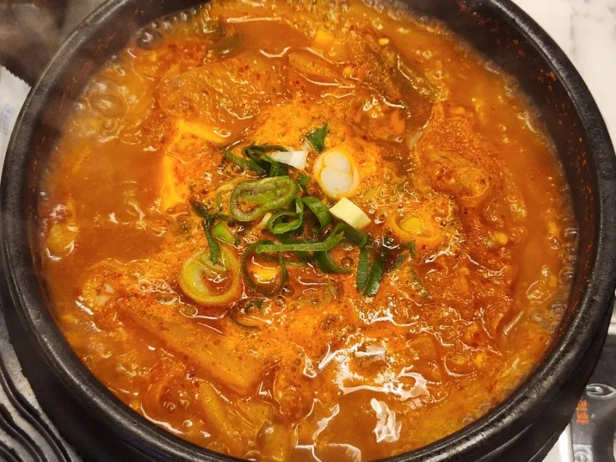 Black pork kimchi stew loaded with meat