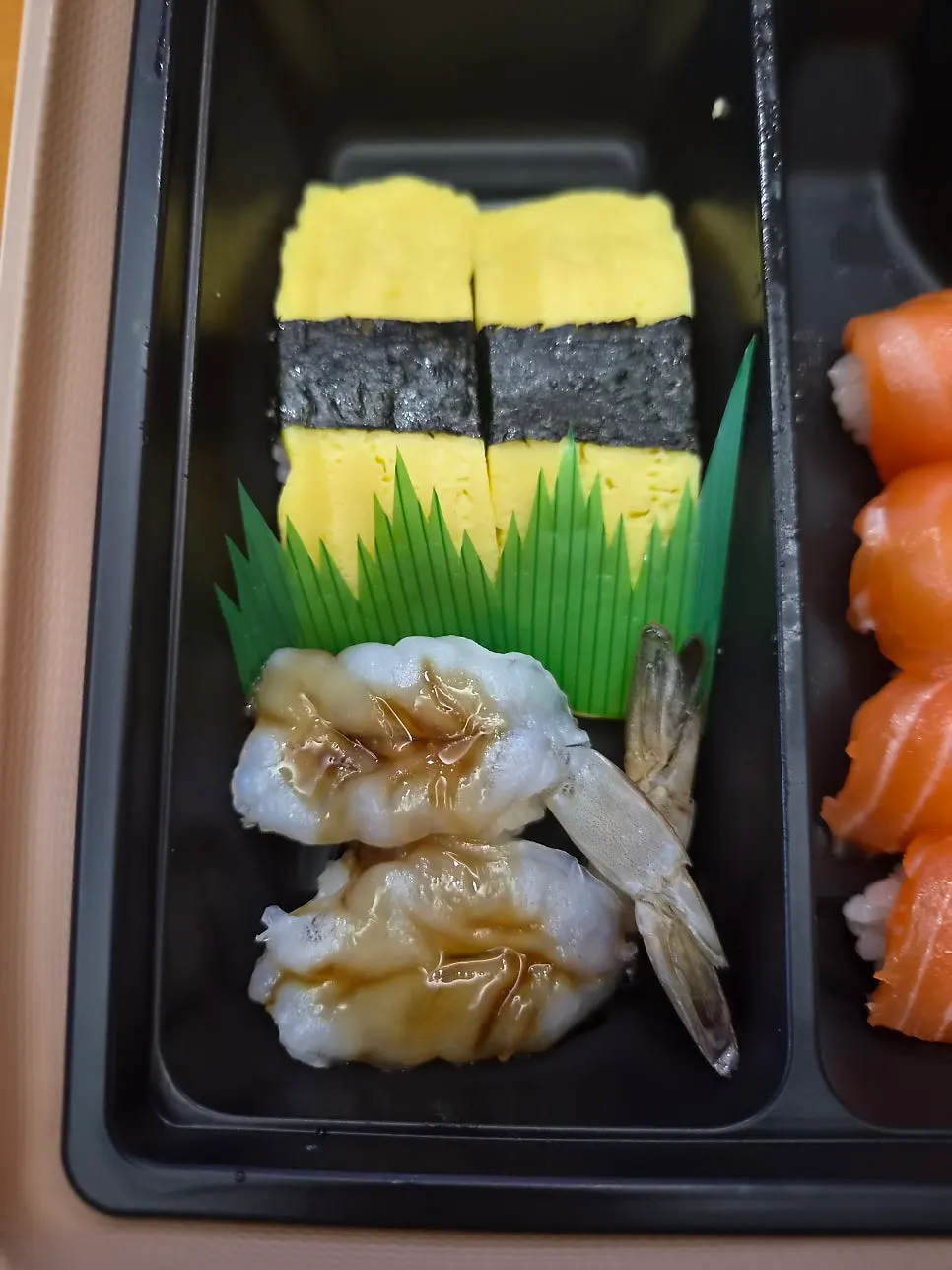 Picking up a piece of sushi