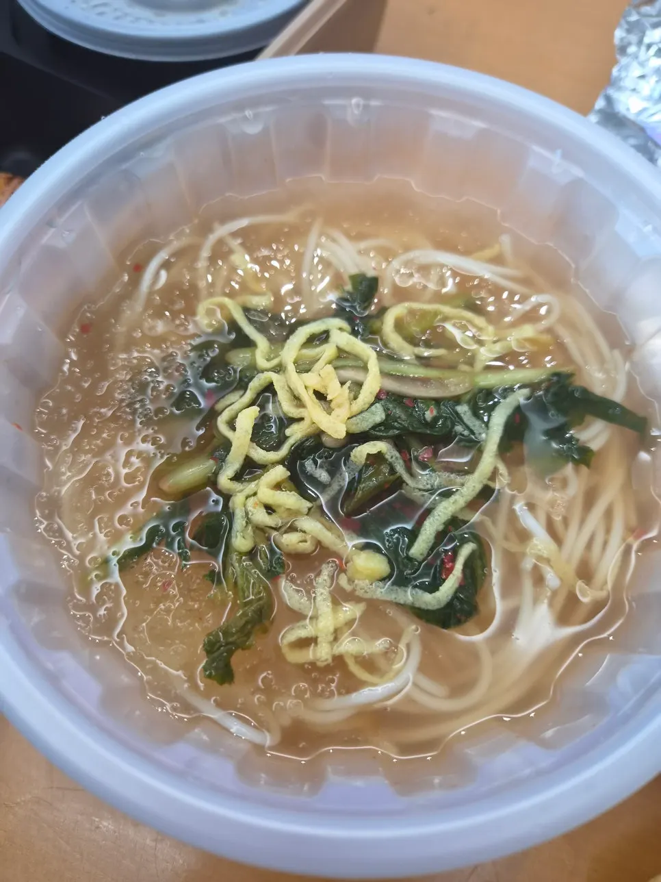 Takeout container of yeolmu naengguksu from Jejju Donghong Branch