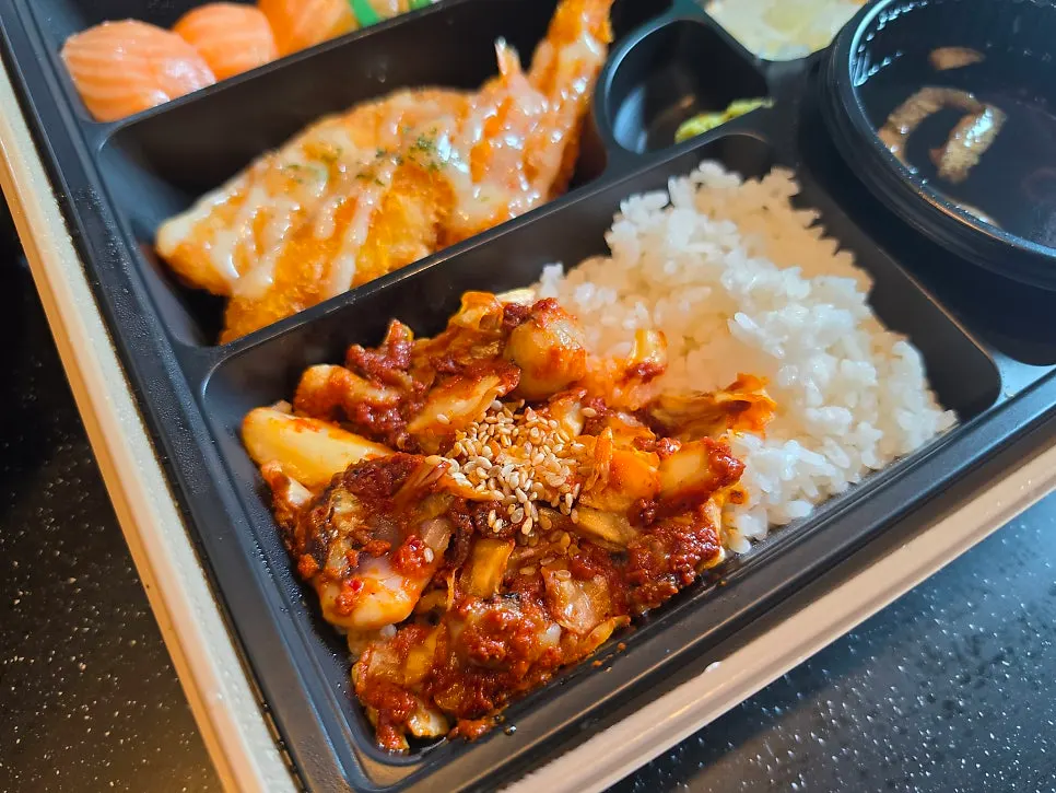 Packed grilled octopus rice bowl with red sauce