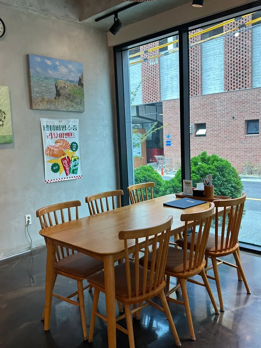 Wood-tone interior of Jejju Donghong Branch