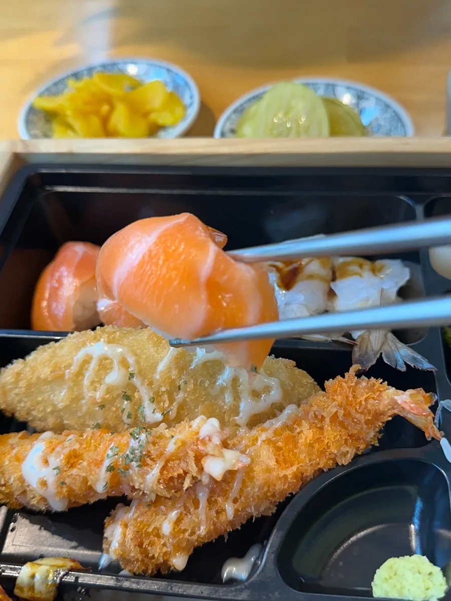 Salmon and shrimp sushi inside the lunch box
