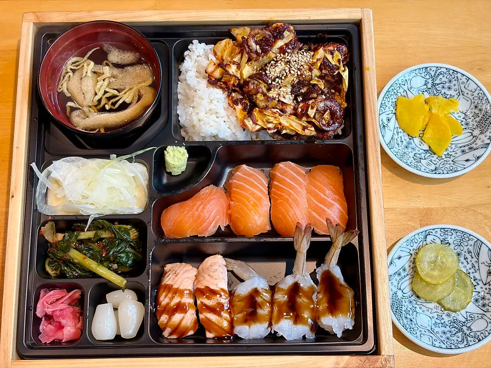 Seogwipo lunch box with jjukkumi rice bowl and sushi