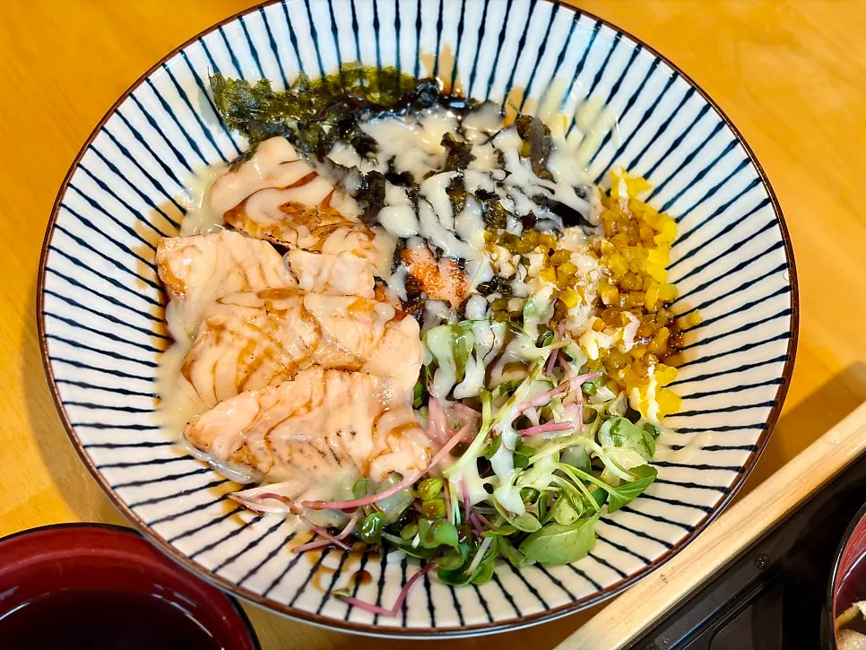 A bowl of the grilled salmon cream mayo bowl