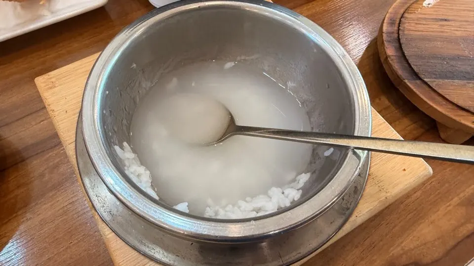 Pot with water poured in after the rice was scooped out, and nurungji