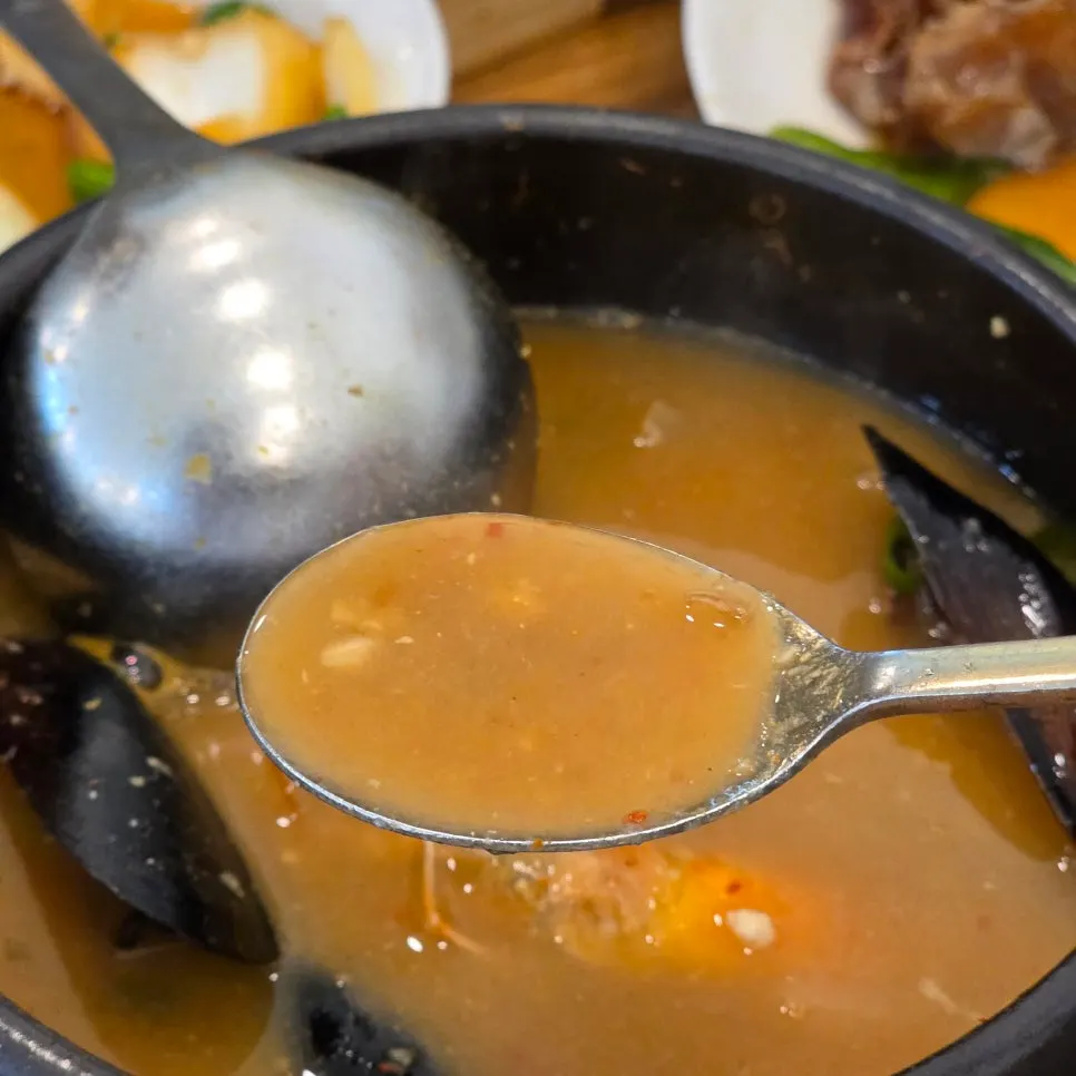 Seafood hot pot with shrimp, blue crab, and mussels